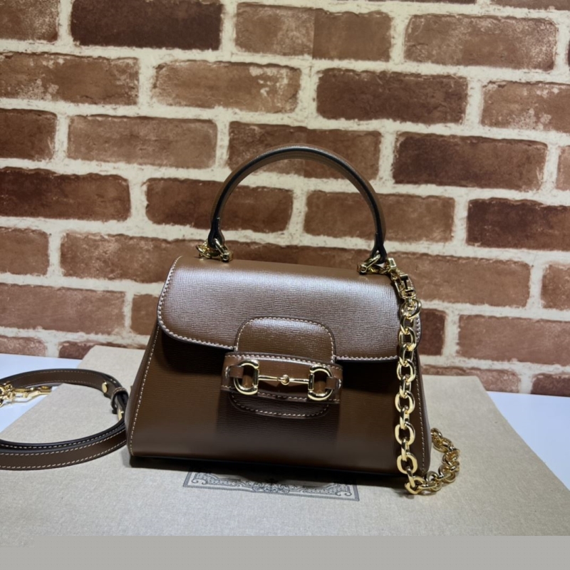 G*u*i top handle bags